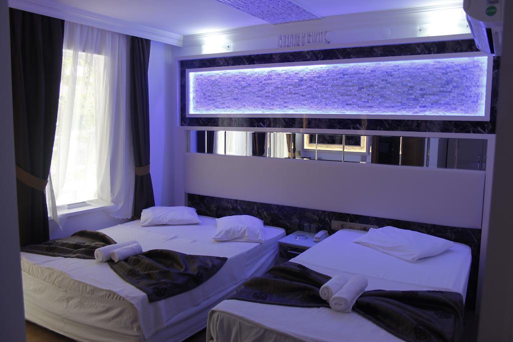 Behram Hotel Antália Quarto foto